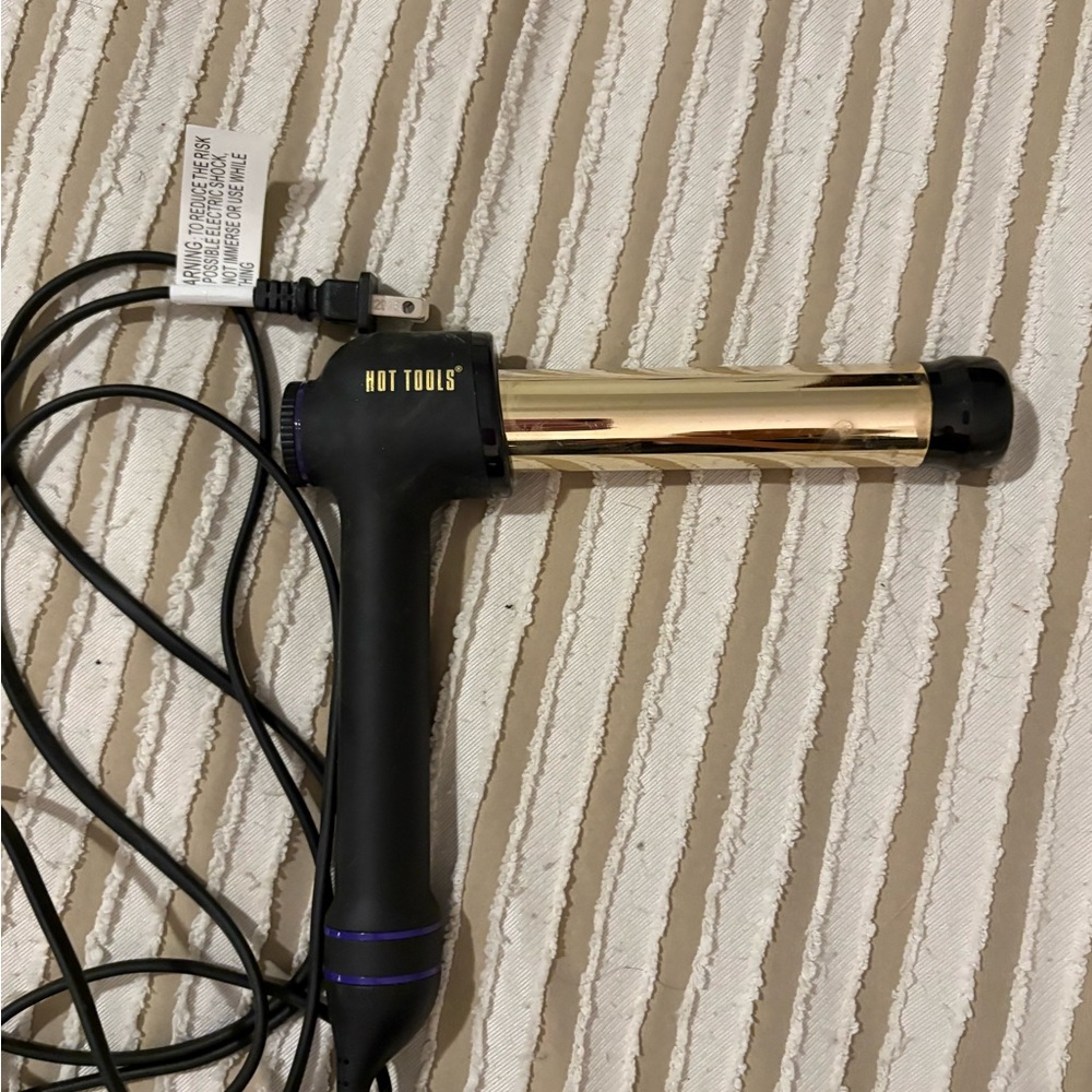 Gold and Black Hair Styling Tool